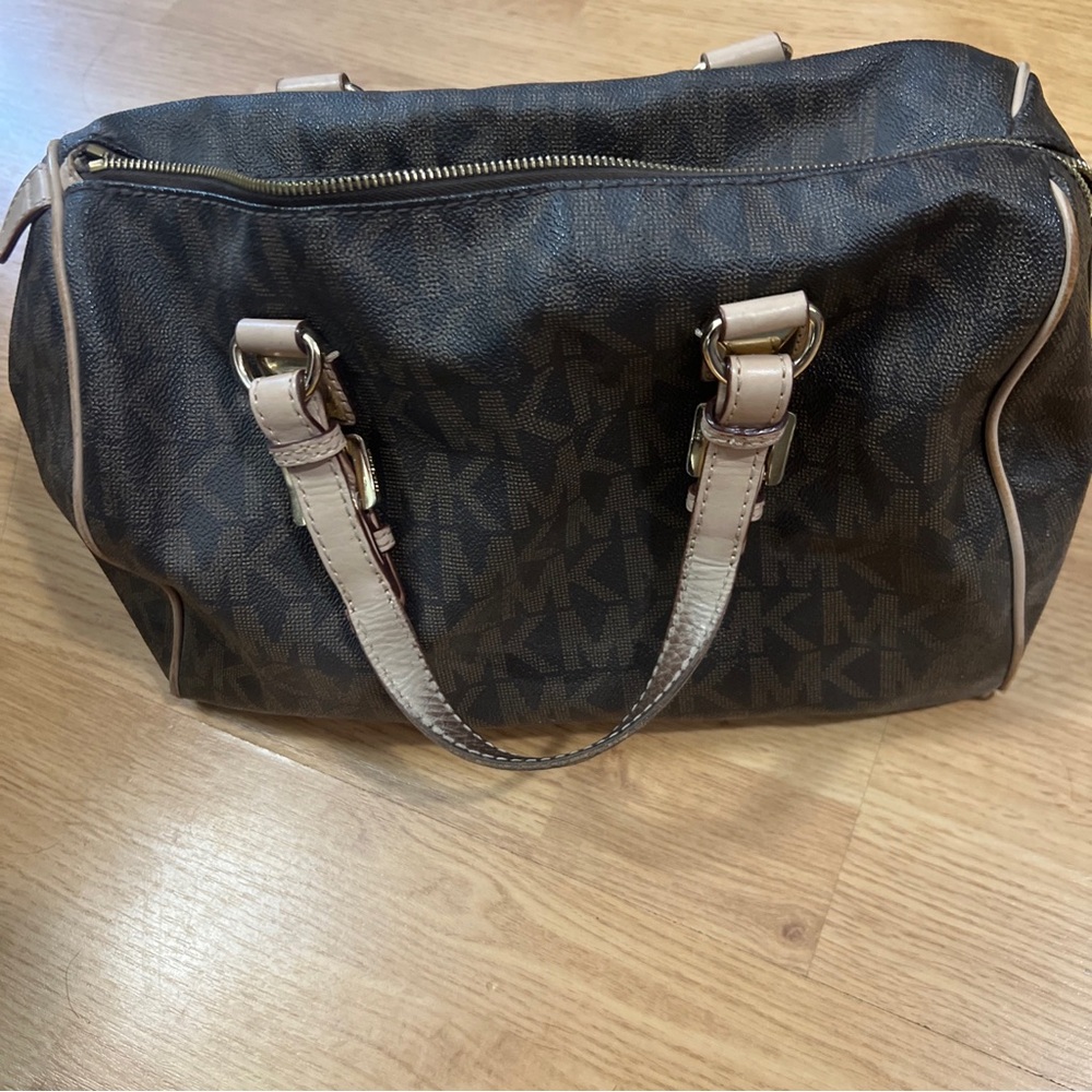 MK satchel with some defects